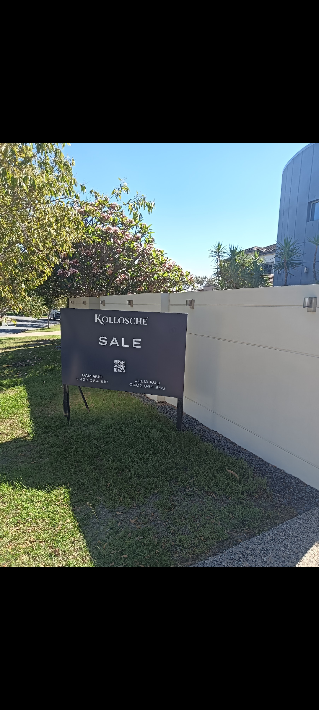 Property after cleaning with real estate sign